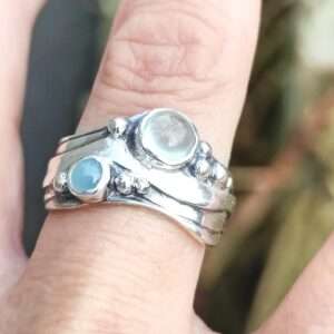 Broad Wave Ring with Pale Blue and blue-green Aquamarine - Image 1