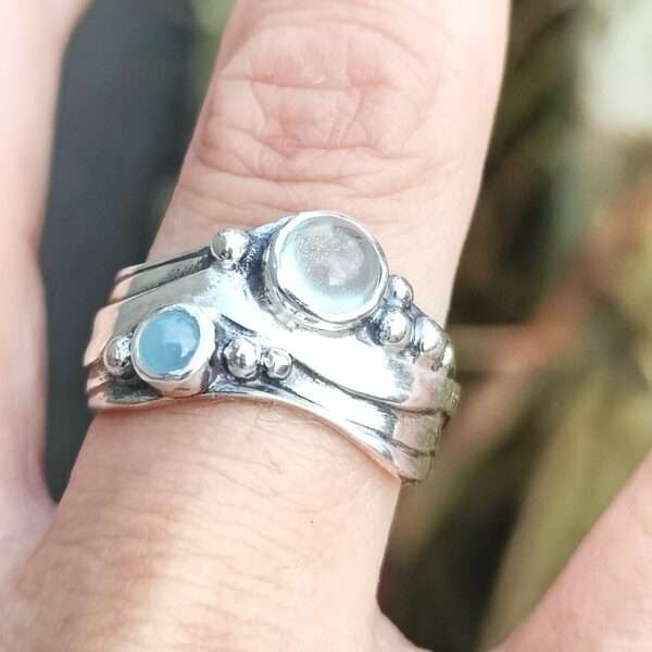Broad Wave Ring with Pale Blue and blue-green Aquamarine