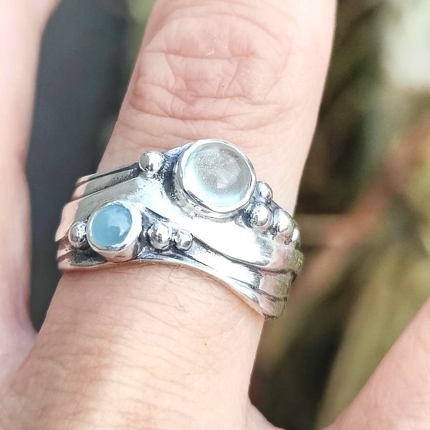 Broad Wave Ring with Pale Blue and blue-green Aquamarine - Image 1