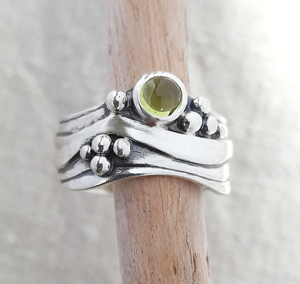 Broad Wave Ring with Peridot