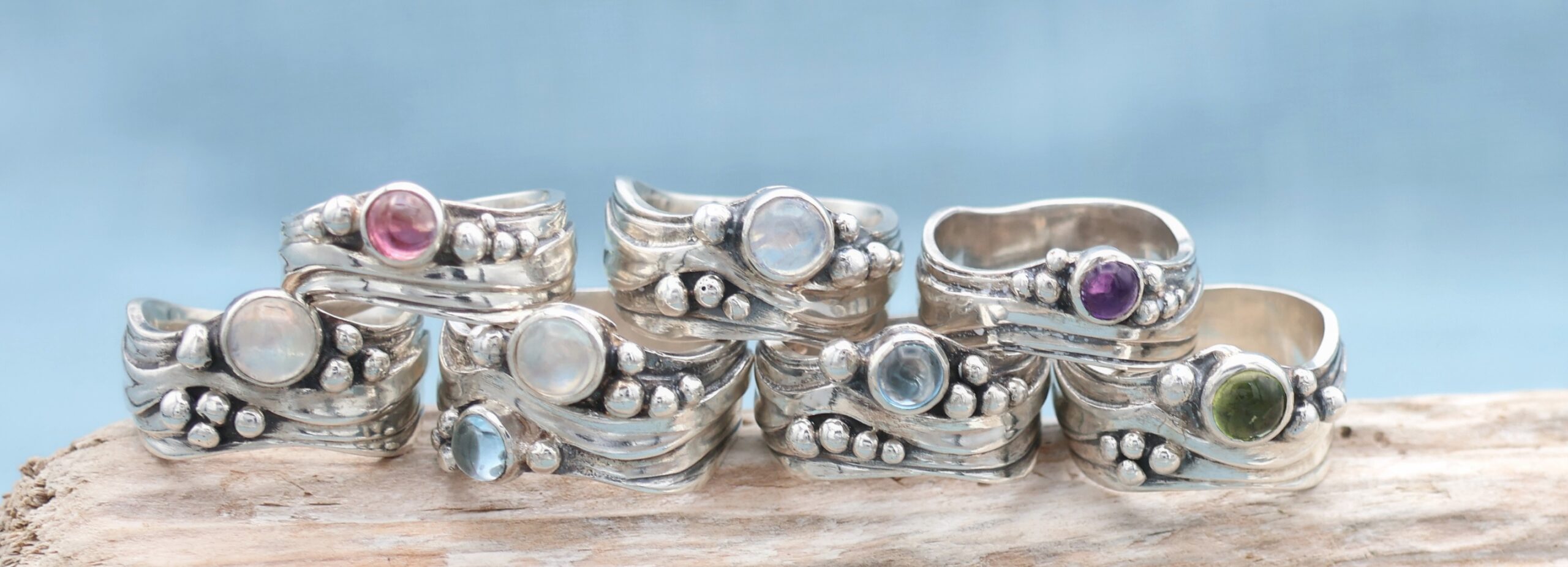 Photograph of Marion's signature wave style rings.